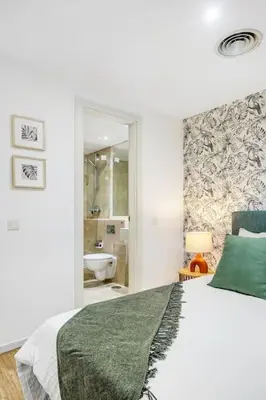 Cama o camas de una habitación en New Heima Gran Vía 2A