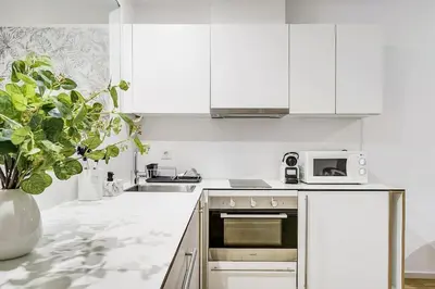 Una cocina o zona de cocina en New Heima Gran Vía 2A