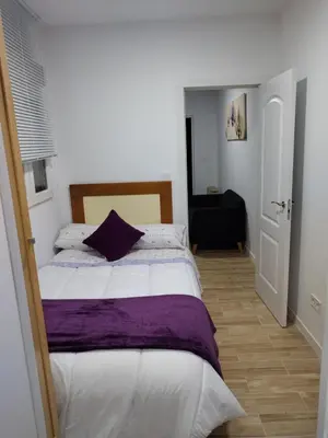 Cama o camas de una habitación en Apartamento A