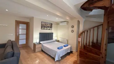 Cama o camas de una habitación en Rooms San Marcos