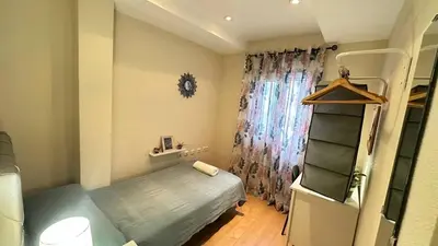 Cama o camas de una habitación en Rooms San Marcos