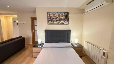 Cama o camas de una habitación en Rooms San Marcos