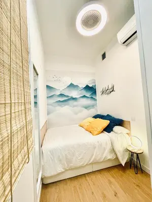 Cama o camas de una habitación en G18_Apartamento para 8 con 3 habitaciones 2 baños en Chamberí