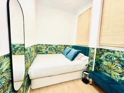 Cama o camas de una habitación en G18_Apartamento para 8 con 3 habitaciones 2 baños en Chamberí