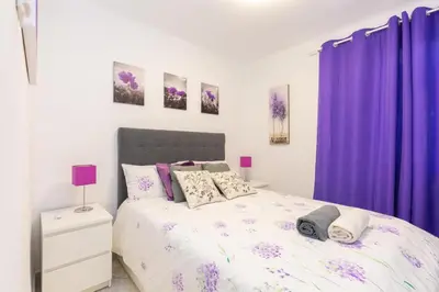 Cama o camas de una habitación en Apartamento Casa de Campo - Alojamiento de temporada