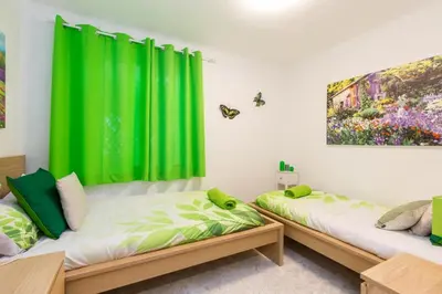 Cama o camas de una habitación en Apartamento Casa de Campo - Alojamiento de temporada