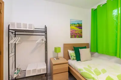 Cama o camas de una habitación en Apartamento Casa de Campo - Alojamiento de temporada