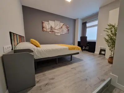 Cama o camas de una habitación en Malasaña Dreams S,L