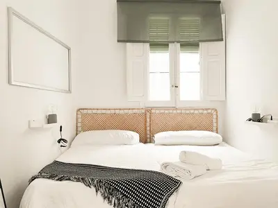 Cama o camas de una habitación en El Refugio del Mesón