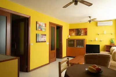 Una televisión o centro de entretenimiento en Cómodo apartamento en el centro - Gran Vía