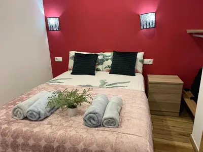 Cama o camas de una habitación en Corazón de gran vía infantas 7