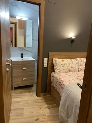 Cama o camas de una habitación en Corazón de gran vía infantas 7
