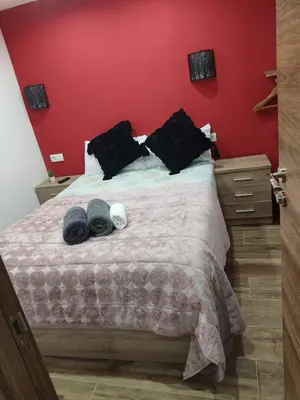 Cama o camas de una habitación en Corazón de gran vía infantas 7
