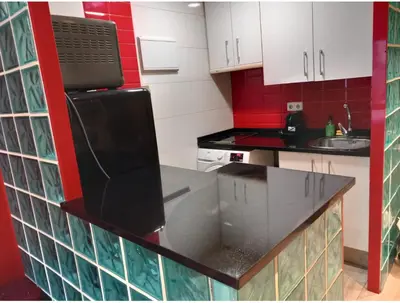 Una cocina o zona de cocina en madrid a las estrellas zerolo 0,1