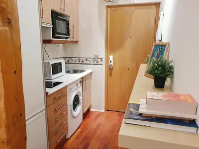 Una cocina o zona de cocina en Enjoy a cosy studio in Malasaña BAR