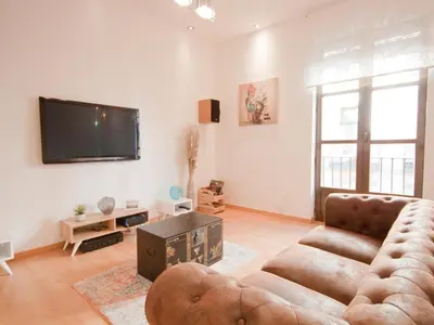 Una televisión o centro de entretenimiento en Apartamento Turistico Cava Alta