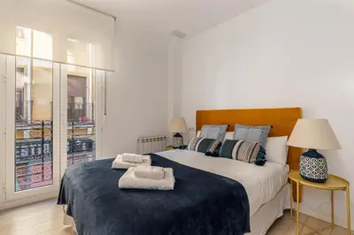 Cama o camas de una habitación en Waou La Latina IV - Alquiler Corta Duración