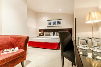 Cama o camas de una habitación en Exe Suites 33