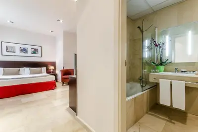 Cama o camas de una habitación en Exe Suites 33