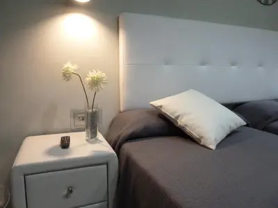Cama o camas de una habitación en Hostal Lauria