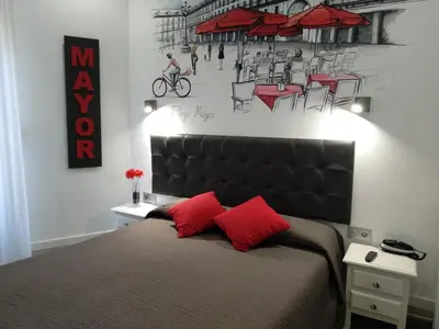 Cama o camas de una habitación en Hostal Lauria