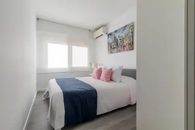 Cama o camas de una habitación en Apartamento junto a Gran Vía