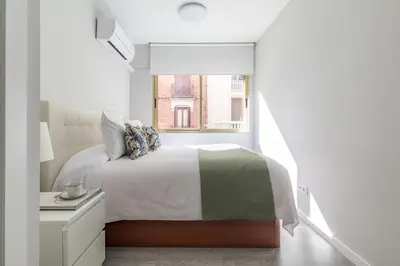 Cama o camas de una habitación en Apartamento junto a Gran Vía