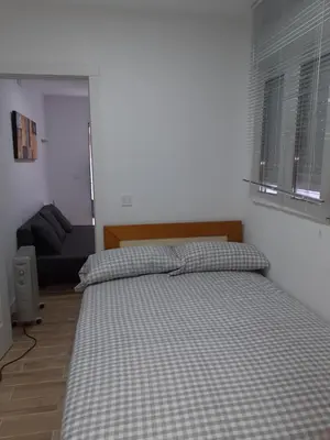 Cama o camas de una habitación en Apartamento C