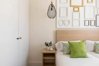 Cama o camas de una habitación en Apartamentos Blume Conde Aranda
