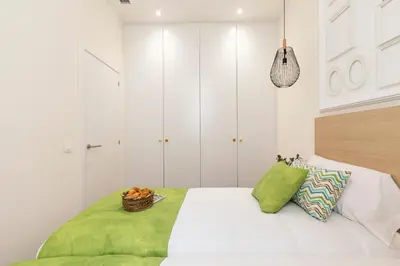 Cama o camas de una habitación en Apartamentos Blume Conde Aranda