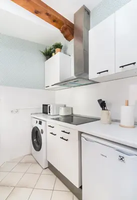 Una cocina o zona de cocina en Historic penthouse Plaza Mayor in Madrid