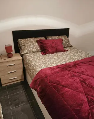 Cama o camas de una habitación en Tesoro de madrid centro