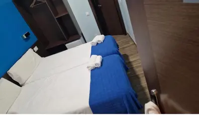 Cama o camas de una habitación en Hostal corazón de Madrid 3