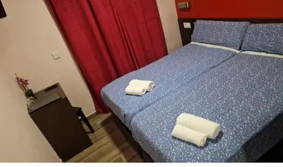 Cama o camas de una habitación en Hostal corazón de Madrid 3