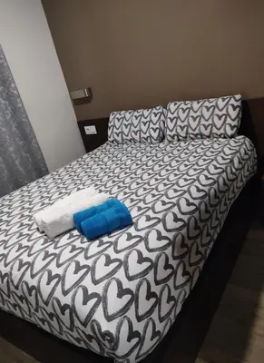 Cama o camas de una habitación en Hostal corazón de Madrid 3