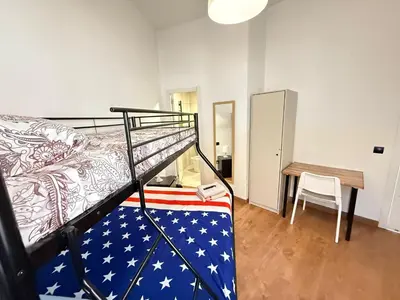 Cama o camas de una habitación en HomeStay Lopez Pando