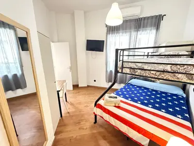 Cama o camas de una habitación en HomeStay Lopez Pando