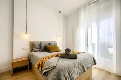 Cama o camas de una habitación en El Cielo: Lujoso Ático en Madrid Centro