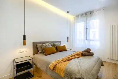 Cama o camas de una habitación en El Cielo: Lujoso Ático en Madrid Centro