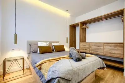Cama o camas de una habitación en El Cielo: Lujoso Ático en Madrid Centro