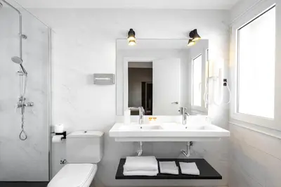 Un baño de Hotel Cortezo