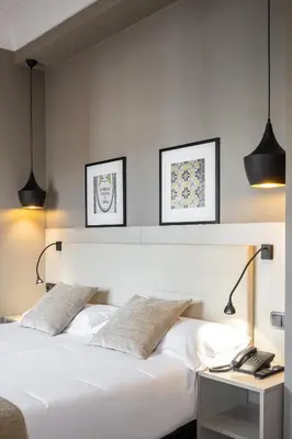Cama o camas de una habitación en Hotel Cortezo