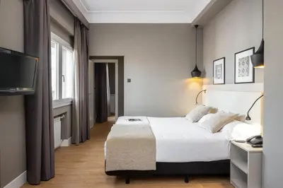 Cama o camas de una habitación en Hotel Cortezo