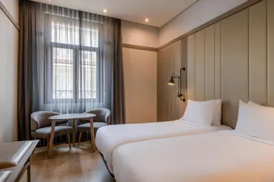 Cama o camas de una habitación en AC Hotel Recoletos by Marriott