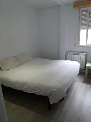 Cama o camas de una habitación en Príncipe habitaciones