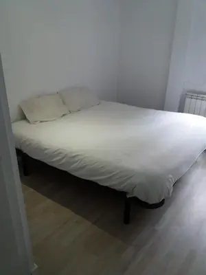 Cama o camas de una habitación en Príncipe habitaciones