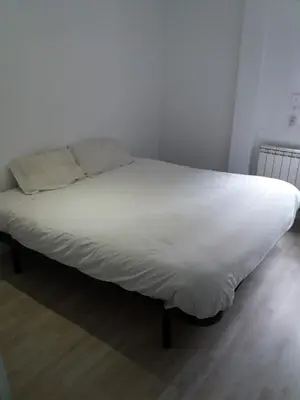 Cama o camas de una habitación en Príncipe habitaciones