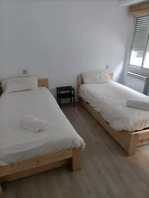 Cama o camas de una habitación en Príncipe habitaciones