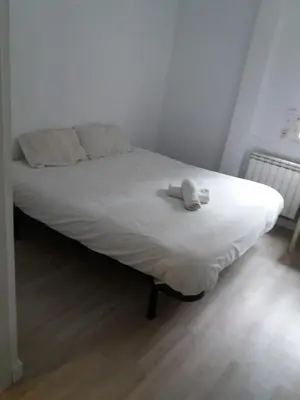 Cama o camas de una habitación en Príncipe habitaciones