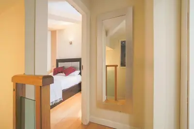 Cama o camas de una habitación en Housing Plaza Mayor by SharingCo